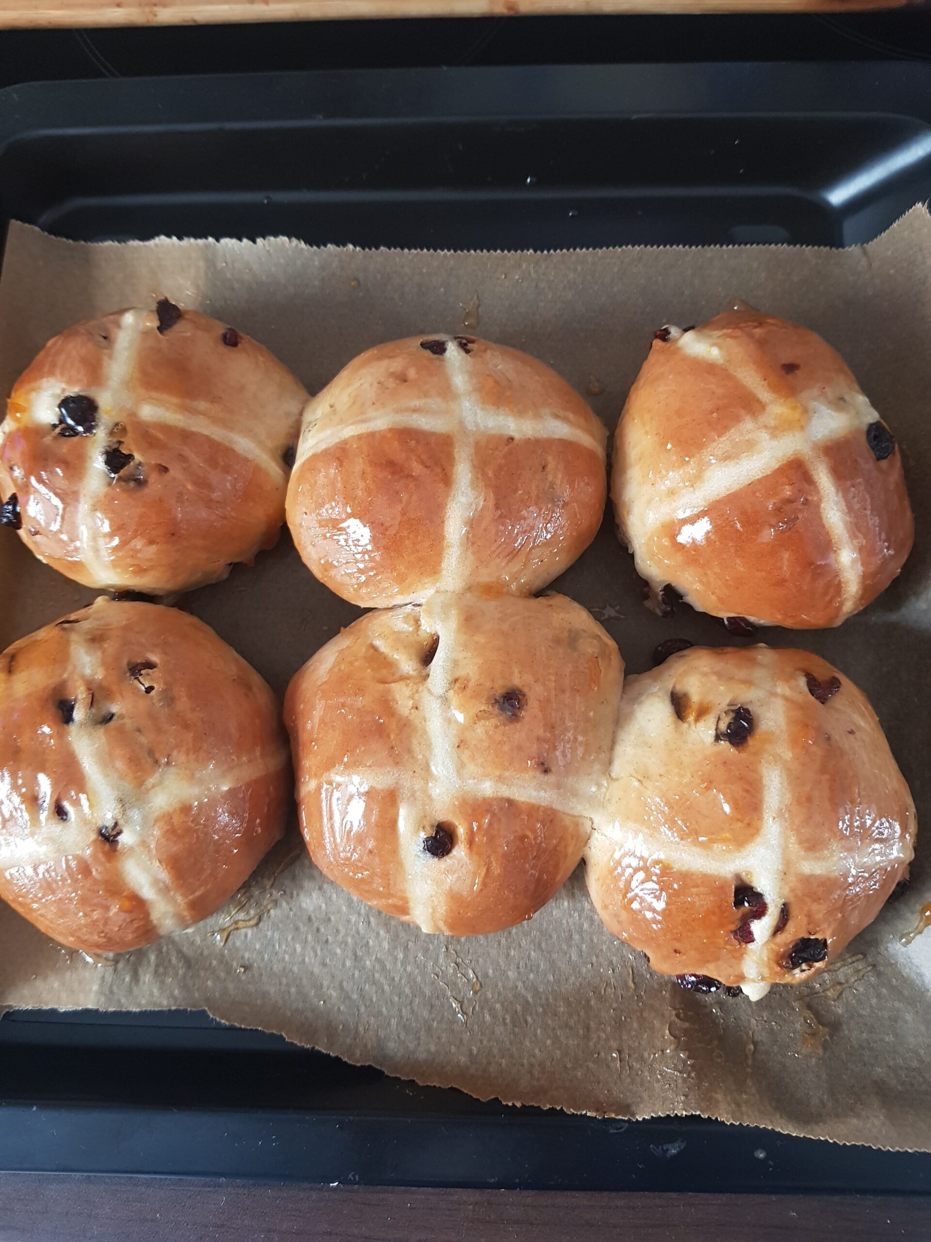 delicious hot cross buns with apricot jam glaze